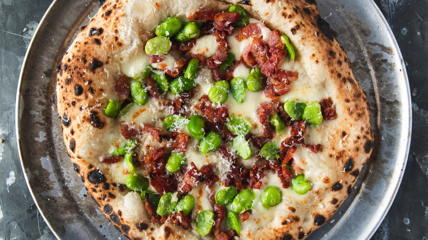 Fava Bean & Bacon Pizza with Lemon Oil Recipe - Gozney recipe poster image