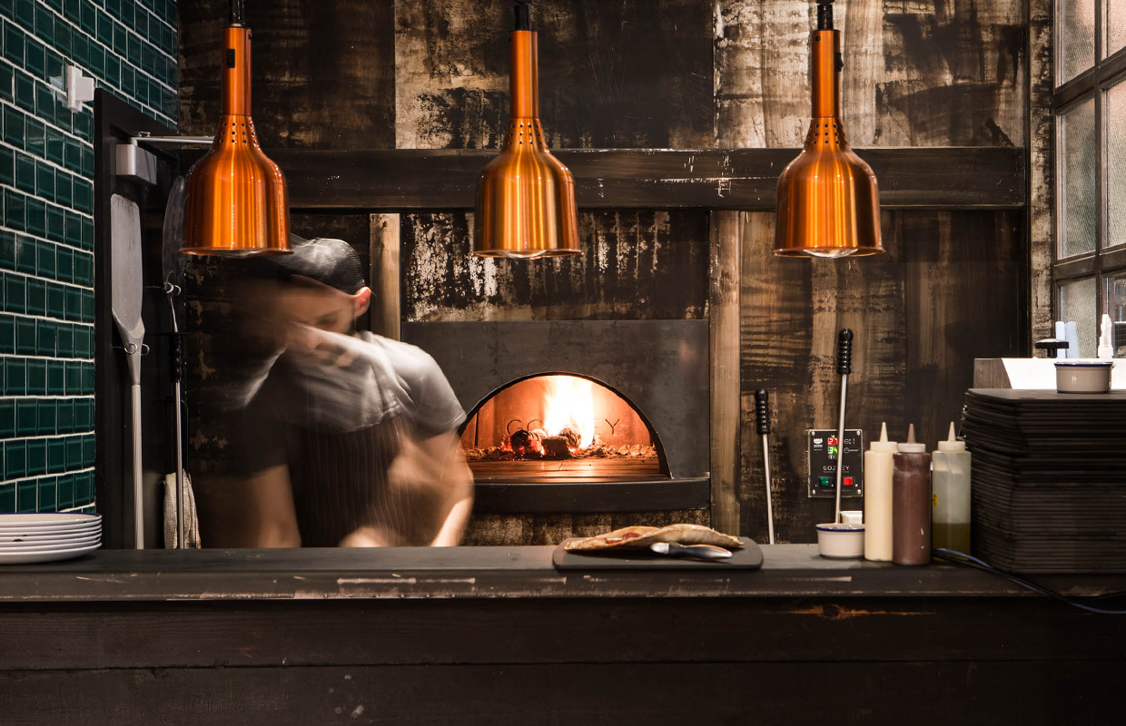 Pizza restaurant with pizza oven blazing