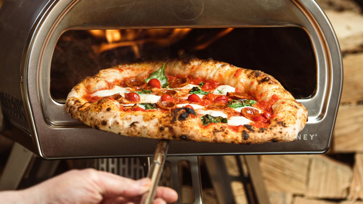 Pizza pulled out of Gozney Roccbox recipe poster image