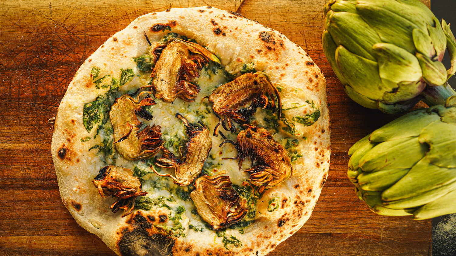 Spinach and Artichoke Pizza Recipe - Gozney Pizza oven recipe poster image