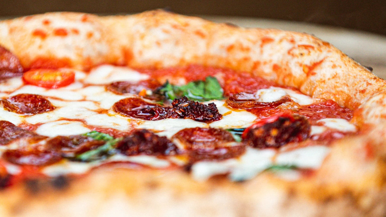 Pizza with pepperoni and chilli honey