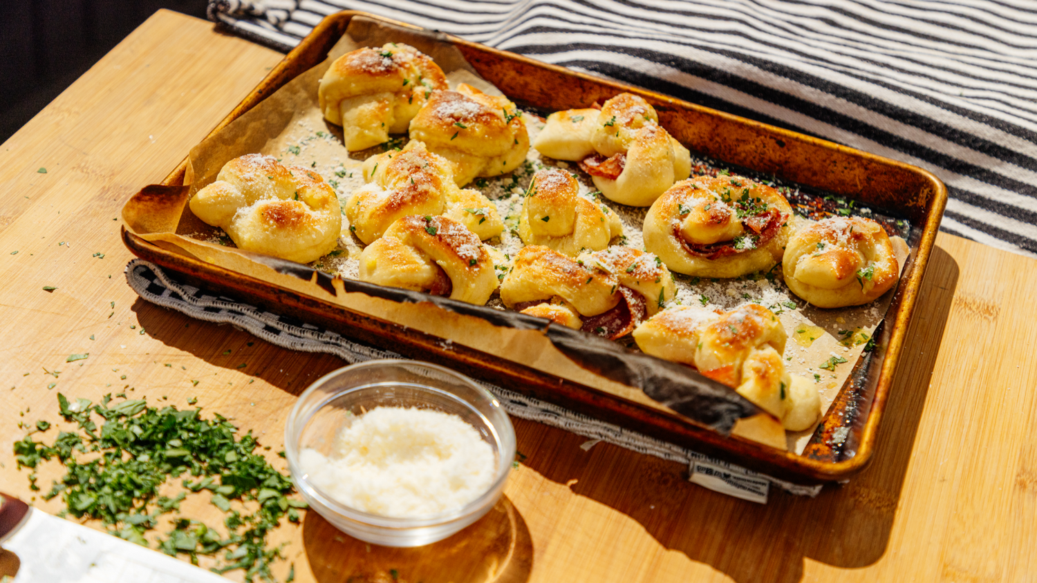 Presented Garlic Knots next to a side of cheese recipe poster image