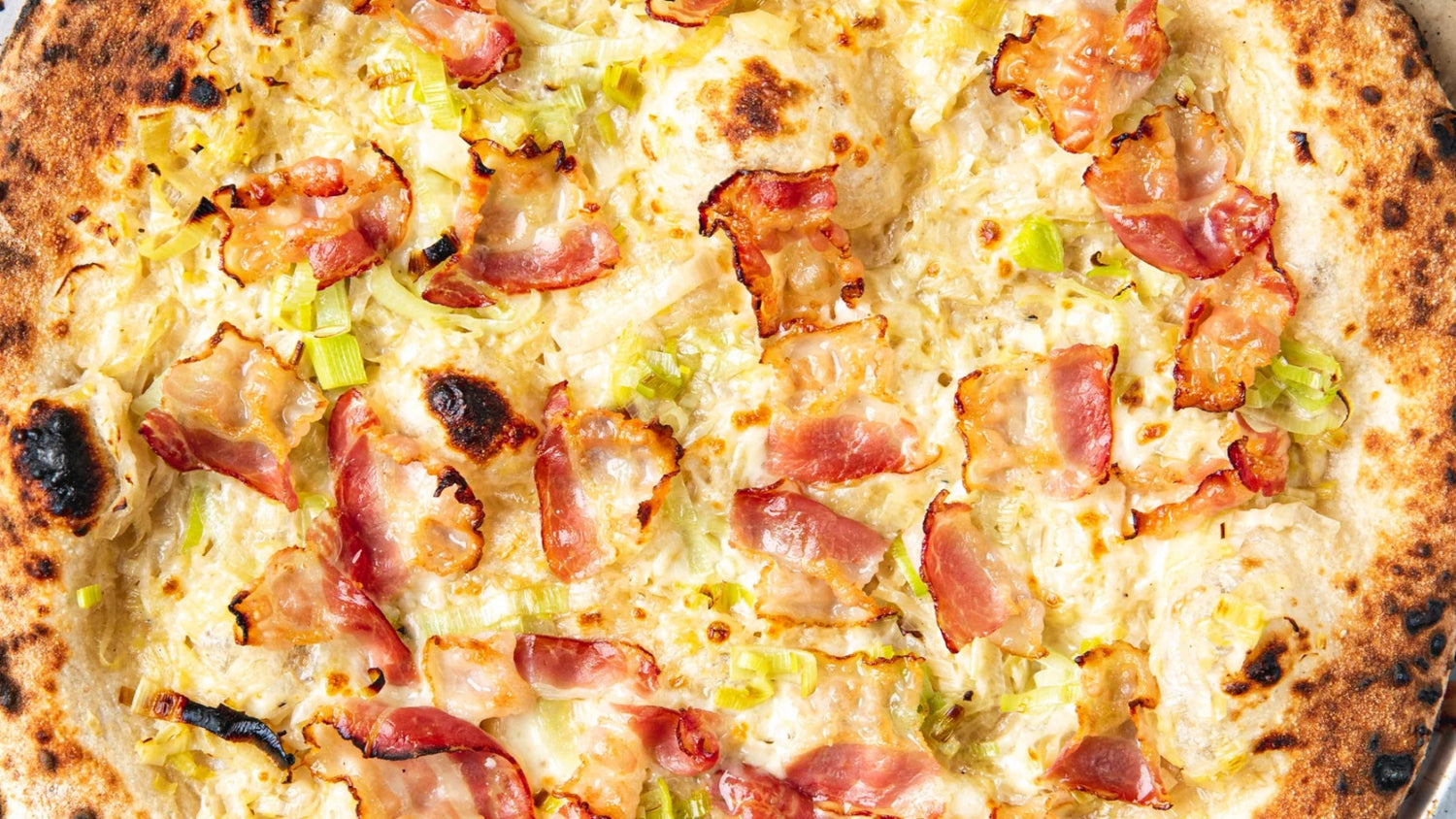 Creamed Leeks & Pancetta NY Style Pizza recipe poster image