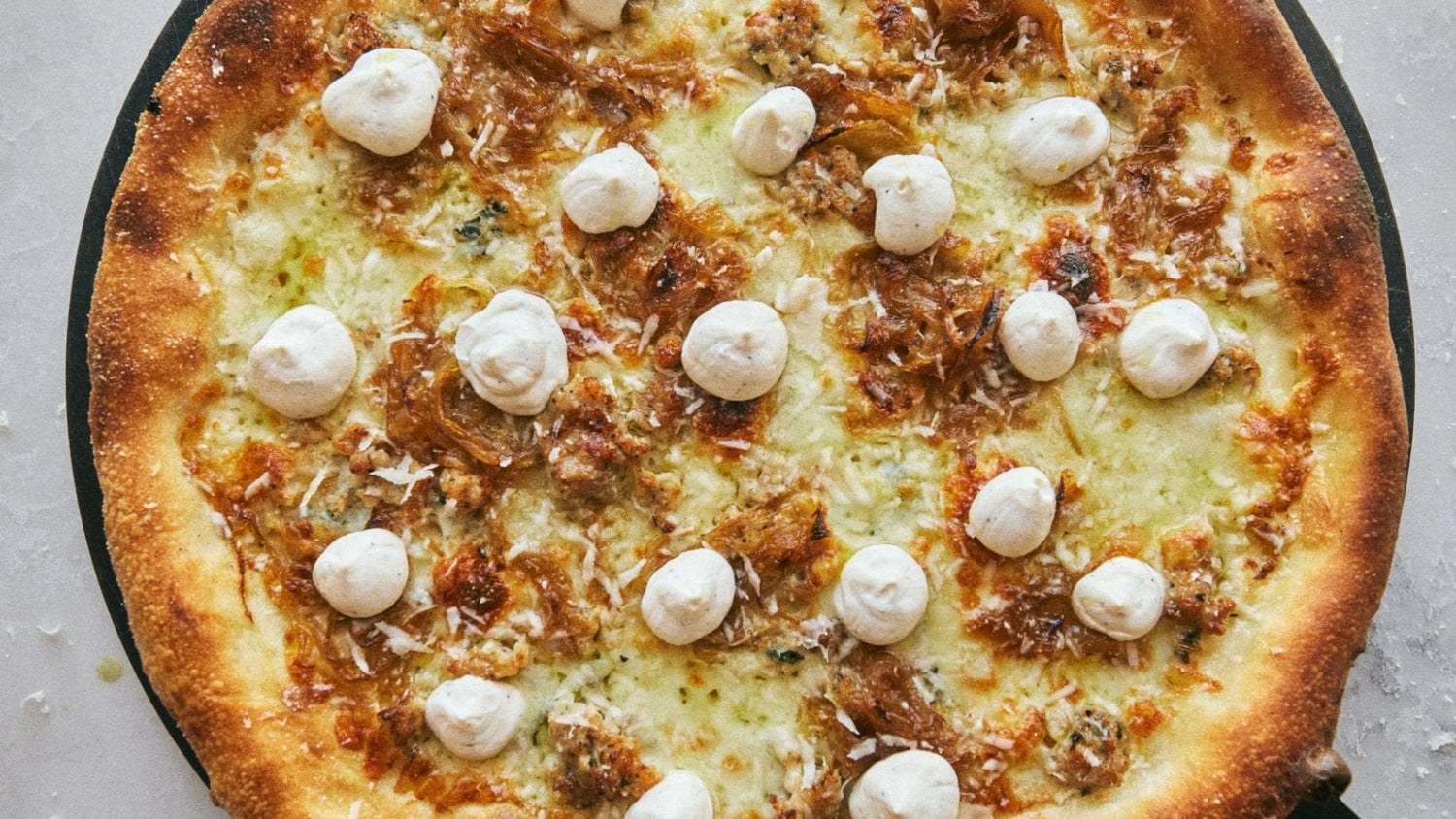 Sausage and Onion Pizza Close Up