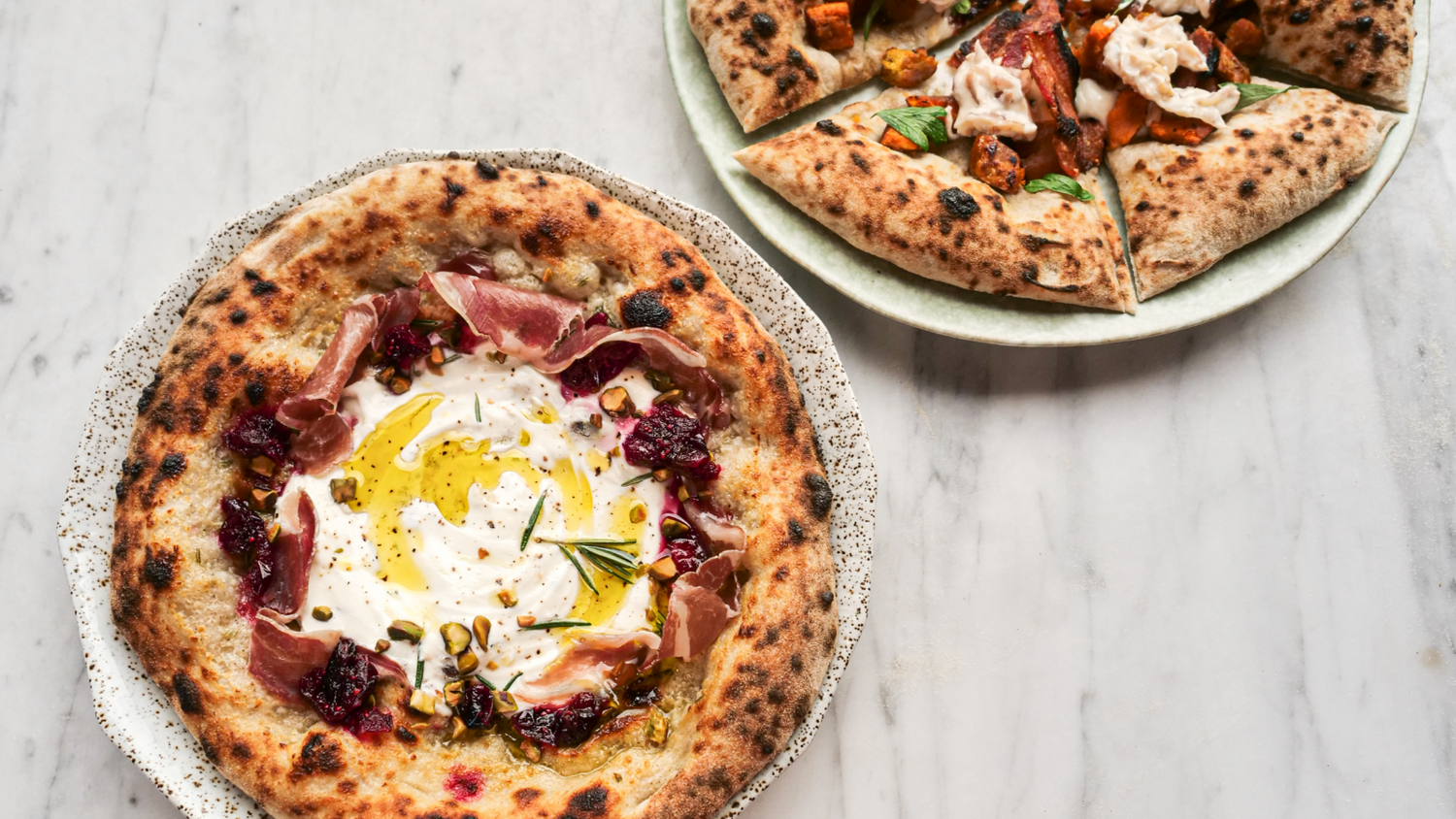 Two Thanksgiving leftover pizzas